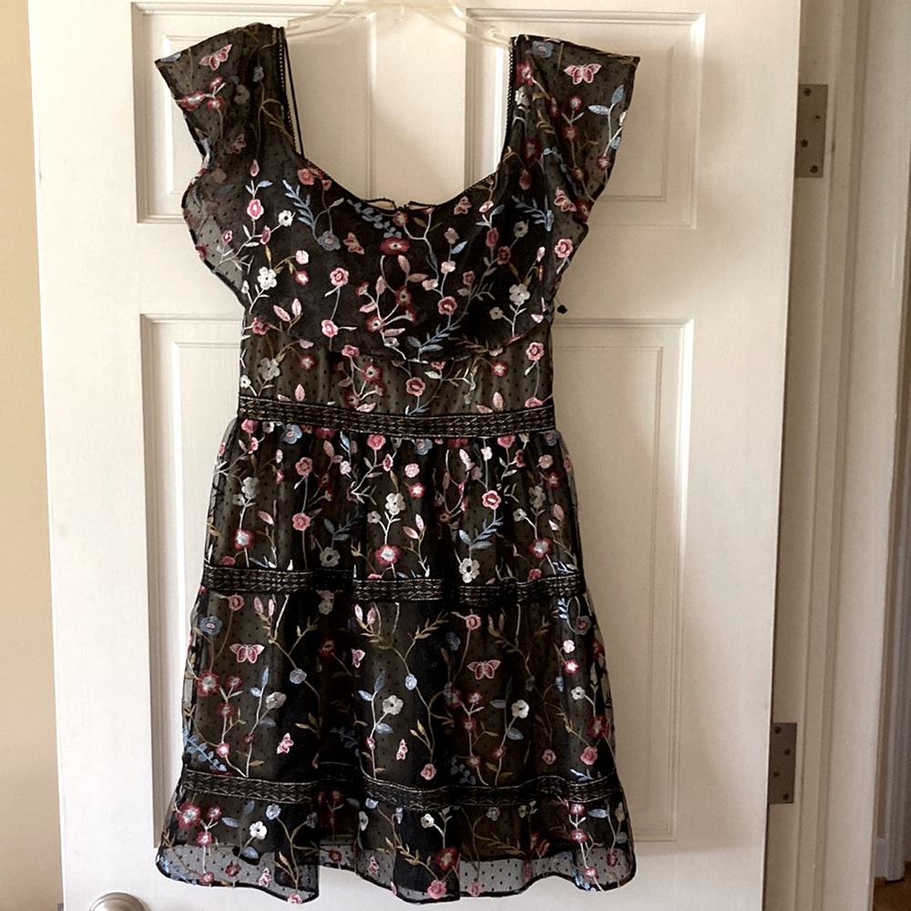 Tired lace embroidered overlay